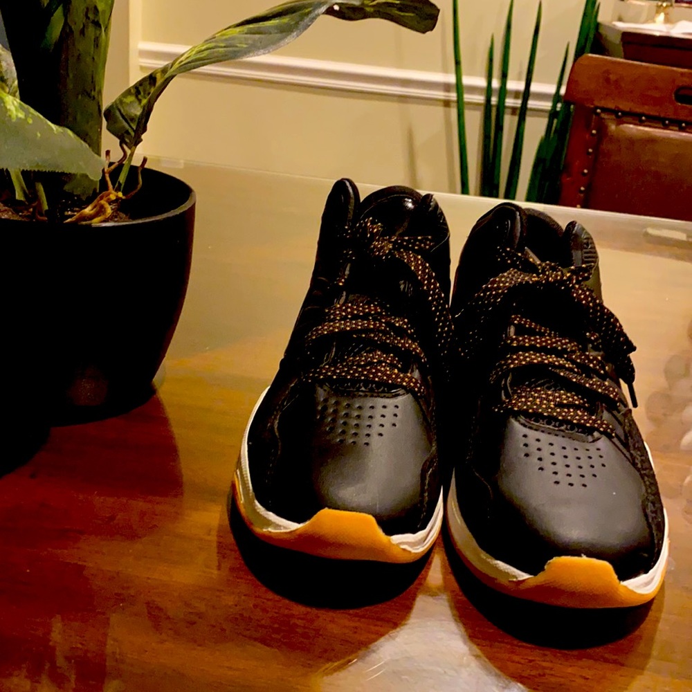 AND1, men’s size 9, black and gold